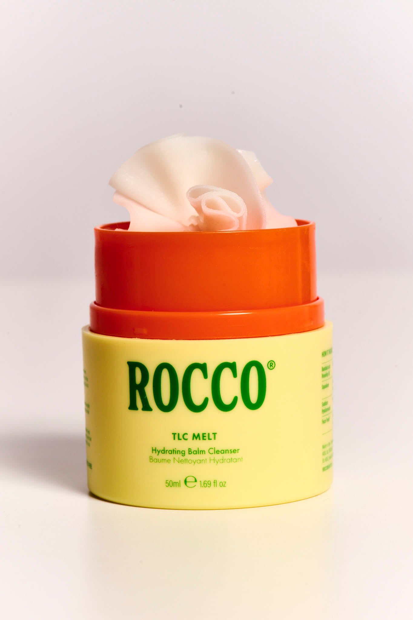 Rocco TLC Melt product with orange cap on a light background